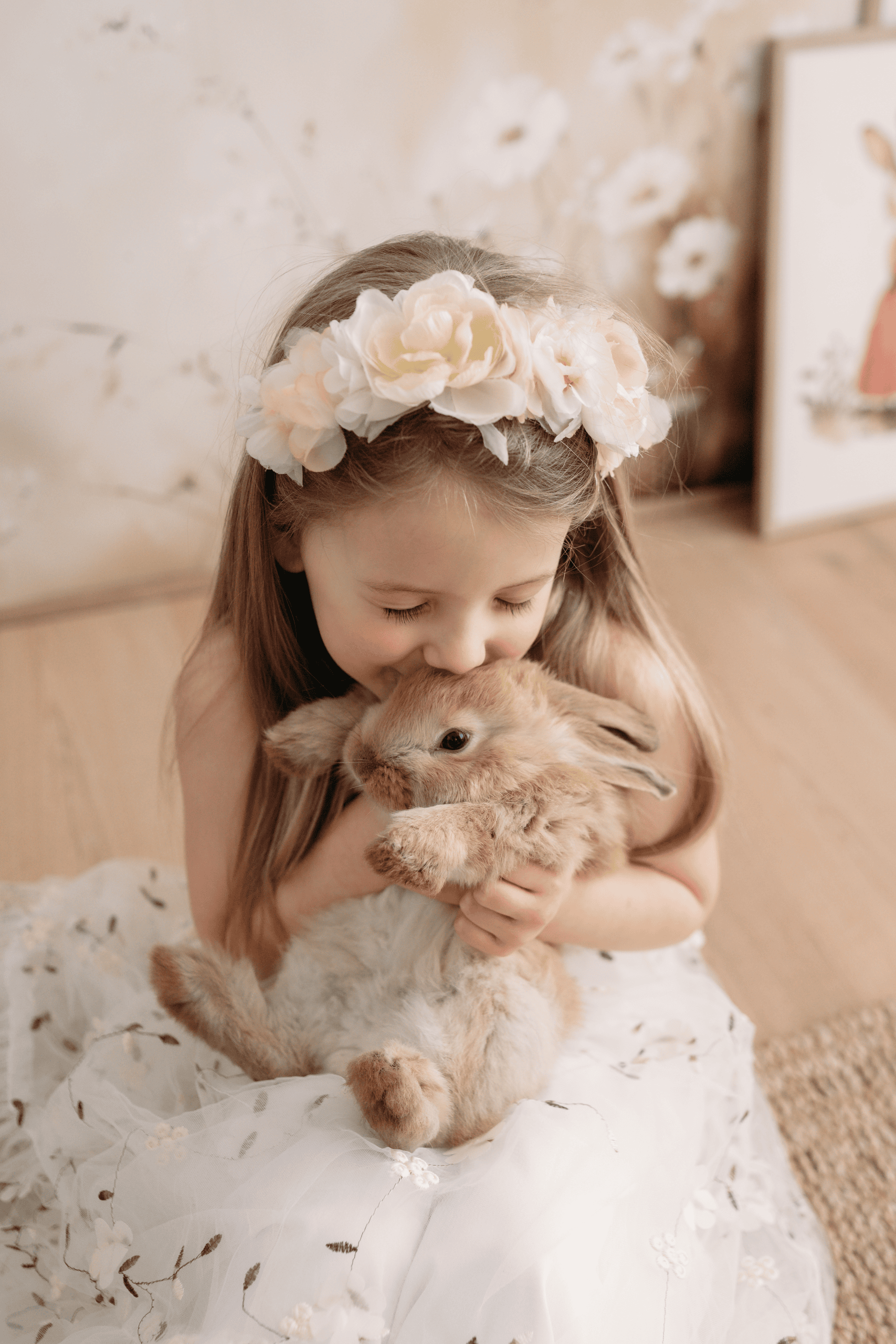 Easter Mini girl holding a bunny for seasonal photography session in Prince George.