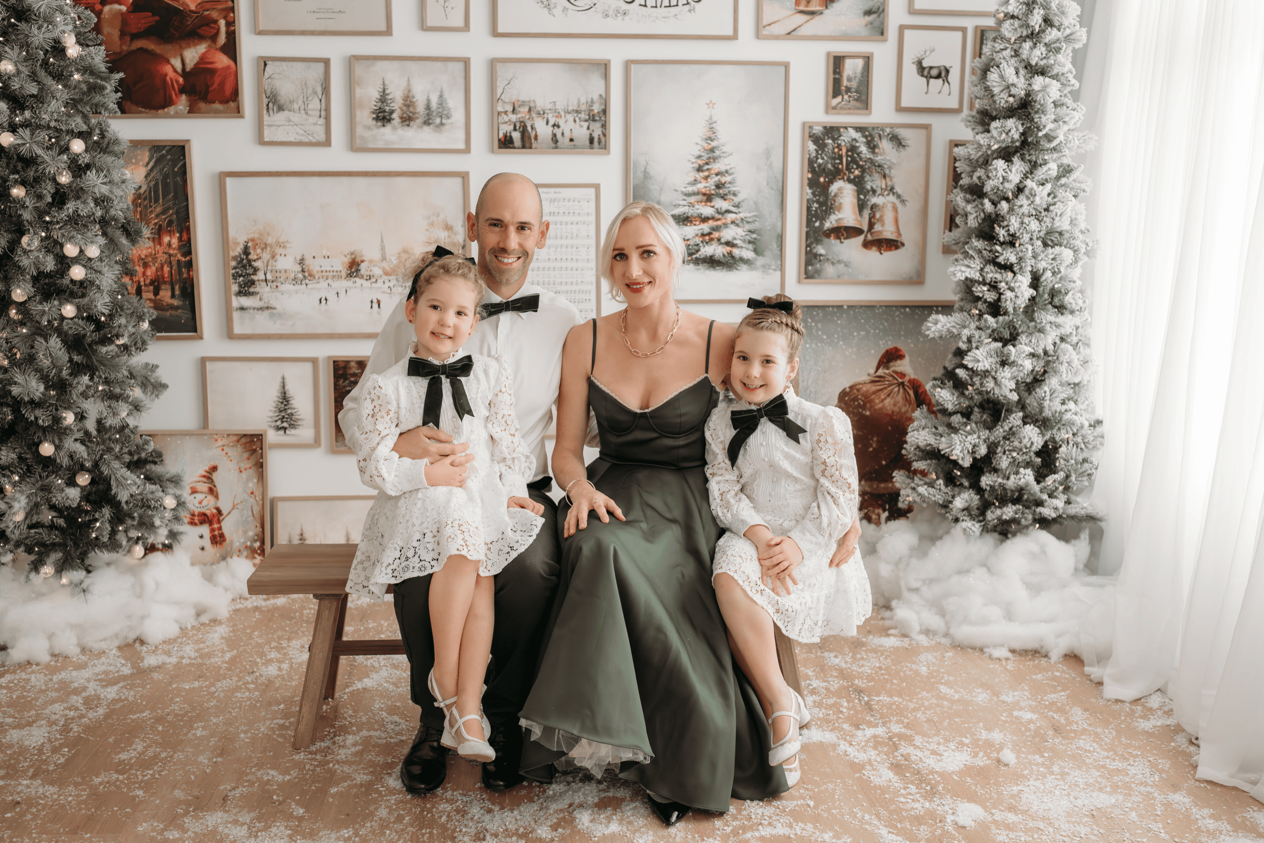 Family portrait with parents and children in festive holiday setting in Prince George, BC.